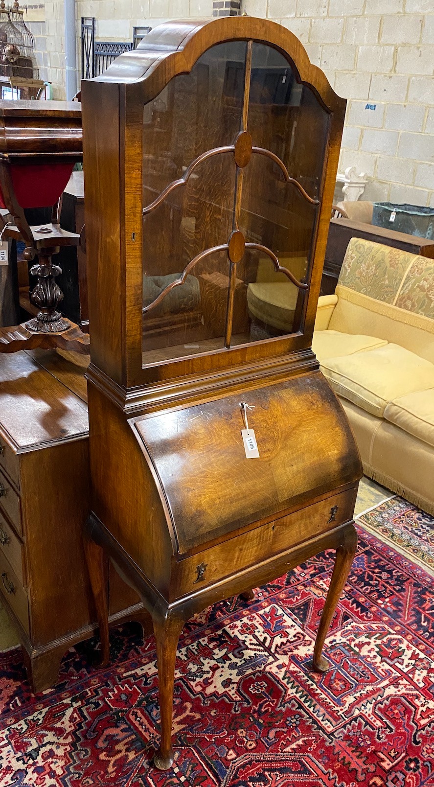 An early 20th century mahogany cylinder bureau bookcase, width 60cm, depth 42cm, height 178cm